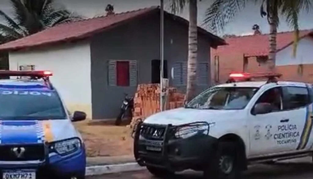 a police car parked in front of a house