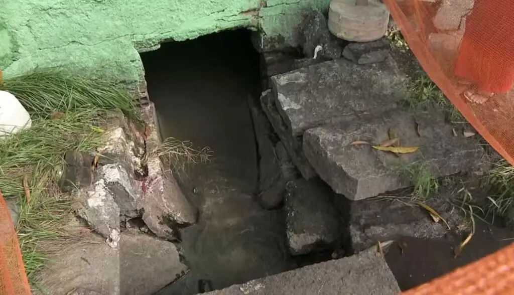 Mulher cai em galeria durante enxurrada e passa três minutos submersa na grande recife.